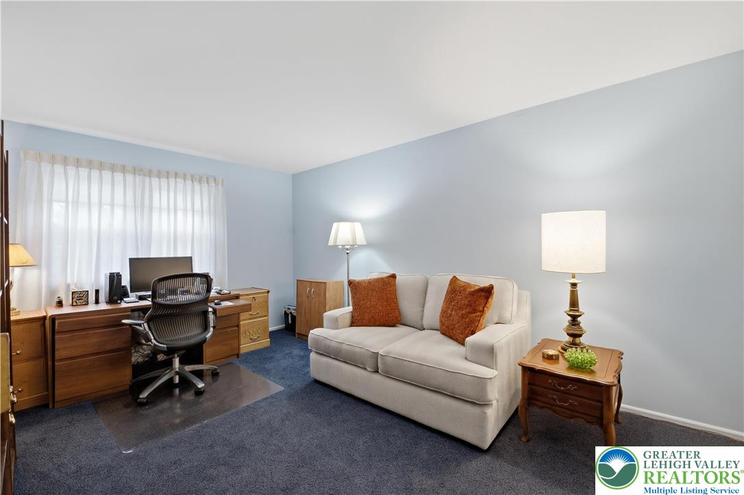 1700 Brandywine Road Allentown, PA 18104 - Photo 36 of 48 a living room with furniture and a lamp