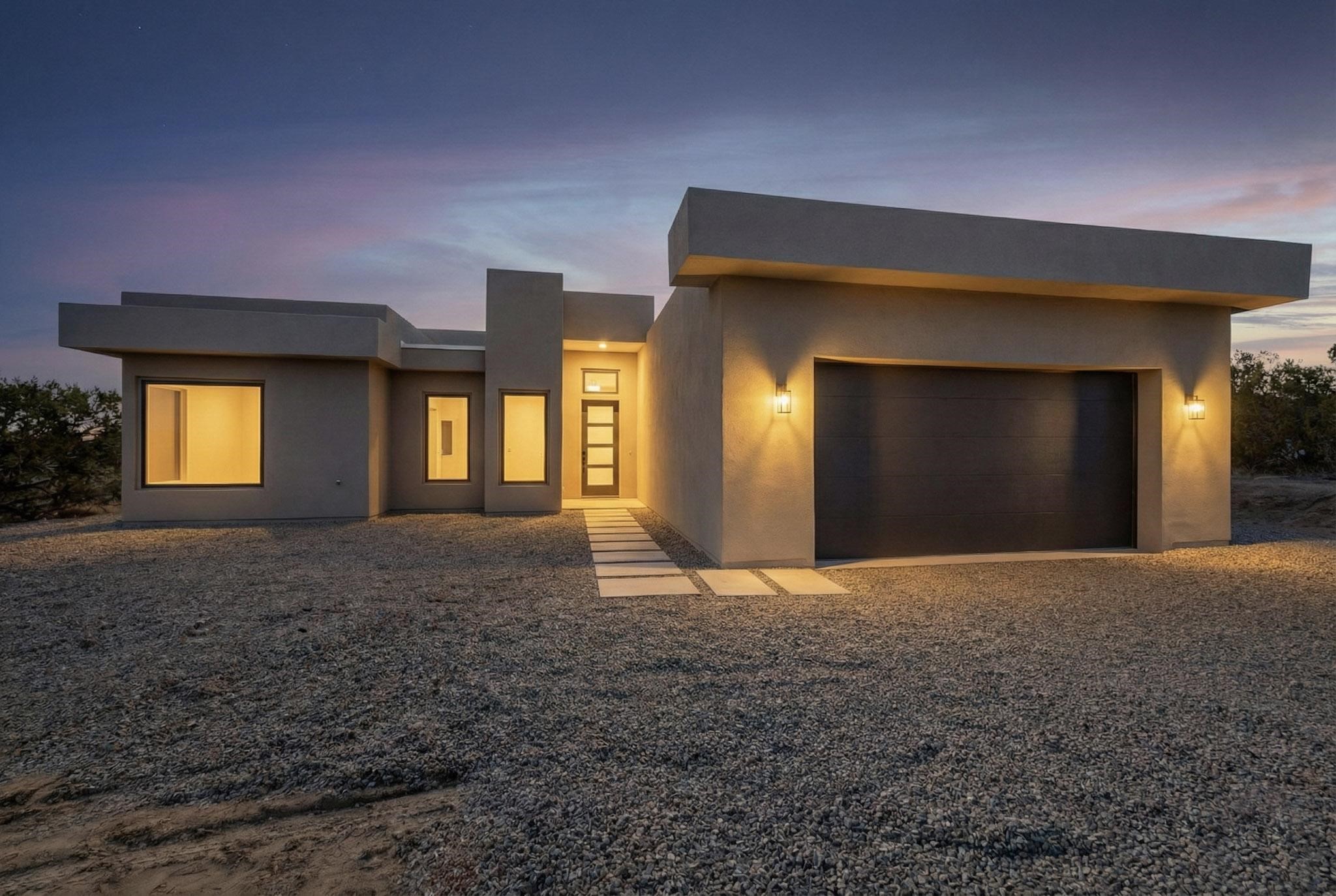 85 Cerro Alto Road Lamy, NM 87540 - Photo 1 of 1 Newly constructed home lights up beautifully during twilight hours.