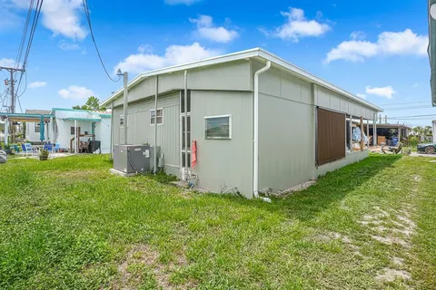 a view of a back yard of the house
