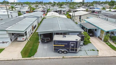an aerial view of a house with a garden space