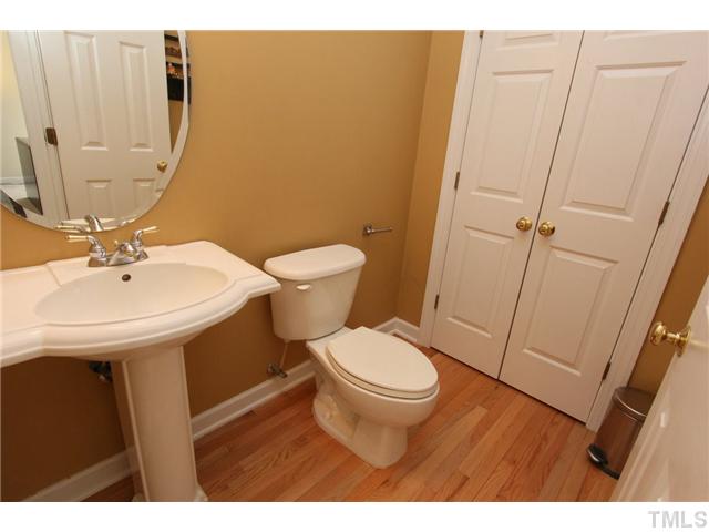 3101 Pyxis Court Raleigh, NC 27614 - Photo 13 of 25 Pedistal sink and hardwoods