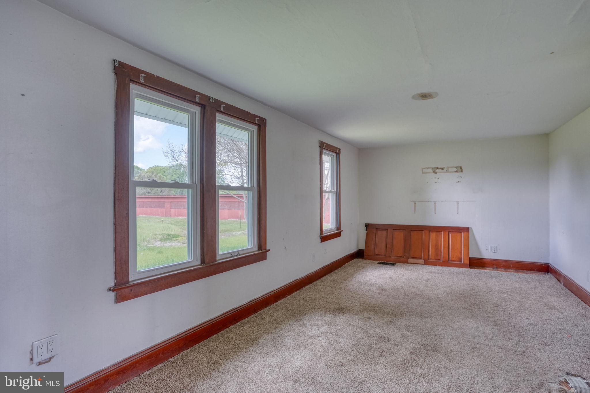 461 Hartly Road Hartly, DE 19953 - Photo 23 of 56 an empty room with windows