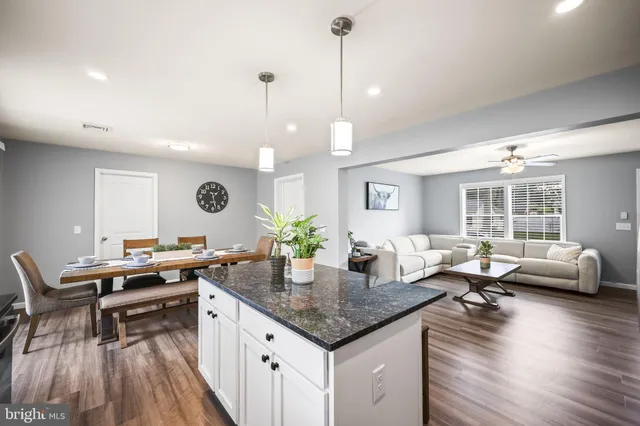 a kitchen with granite countertop lots of counter top space