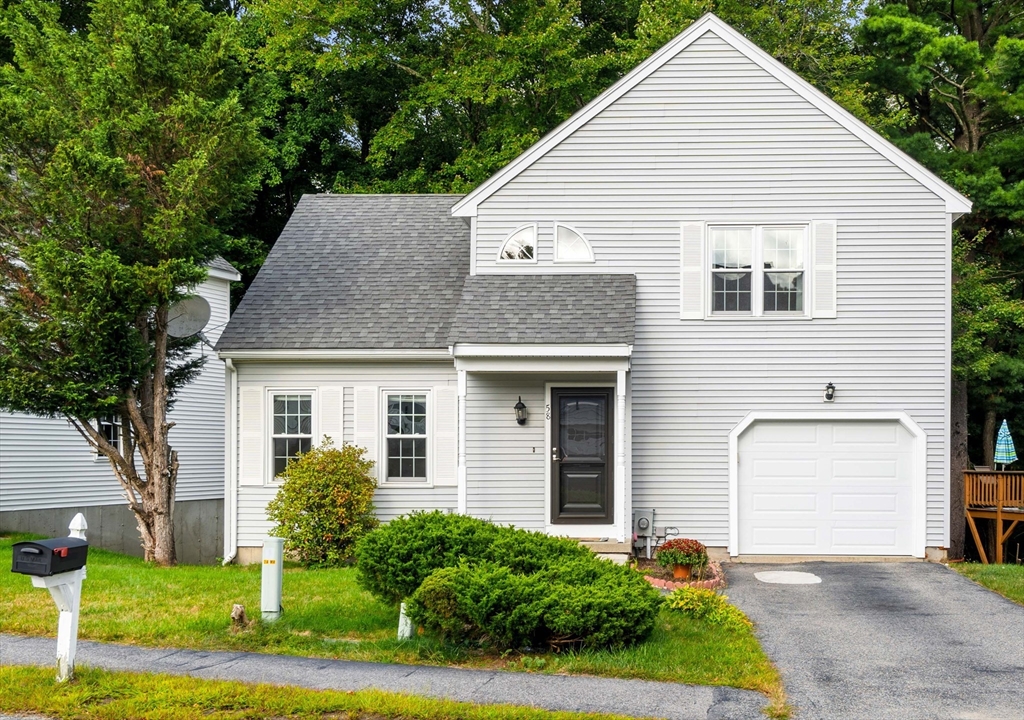 58 Meadowood Road North Andover, MA 01845 - Photo 1 of 31 a view of a house with a yard and plants