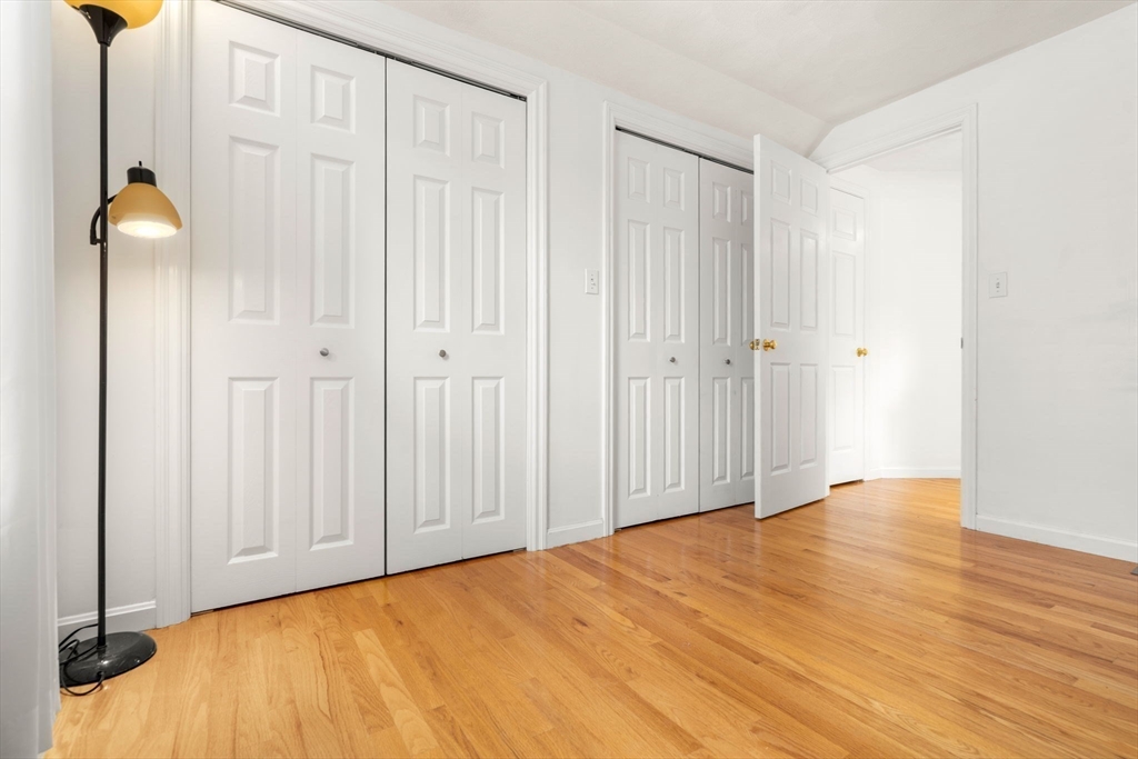 58 Meadowood Road North Andover, MA 01845 - Photo 26 of 31 a view of empty room with wooden floor