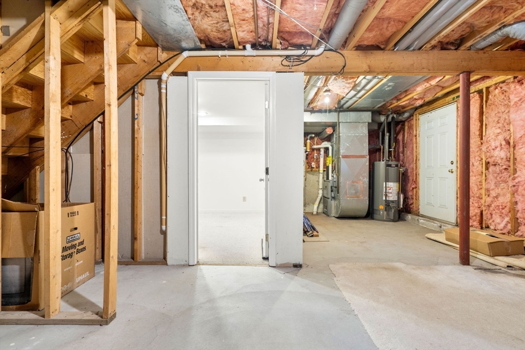 58 Meadowood Road North Andover, MA 01845 - Photo 30 of 31 a view of a hallway with wooden walls
