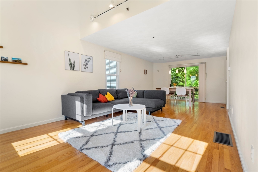 58 Meadowood Road North Andover, MA 01845 - Photo 3 of 31 a living room with furniture and a table