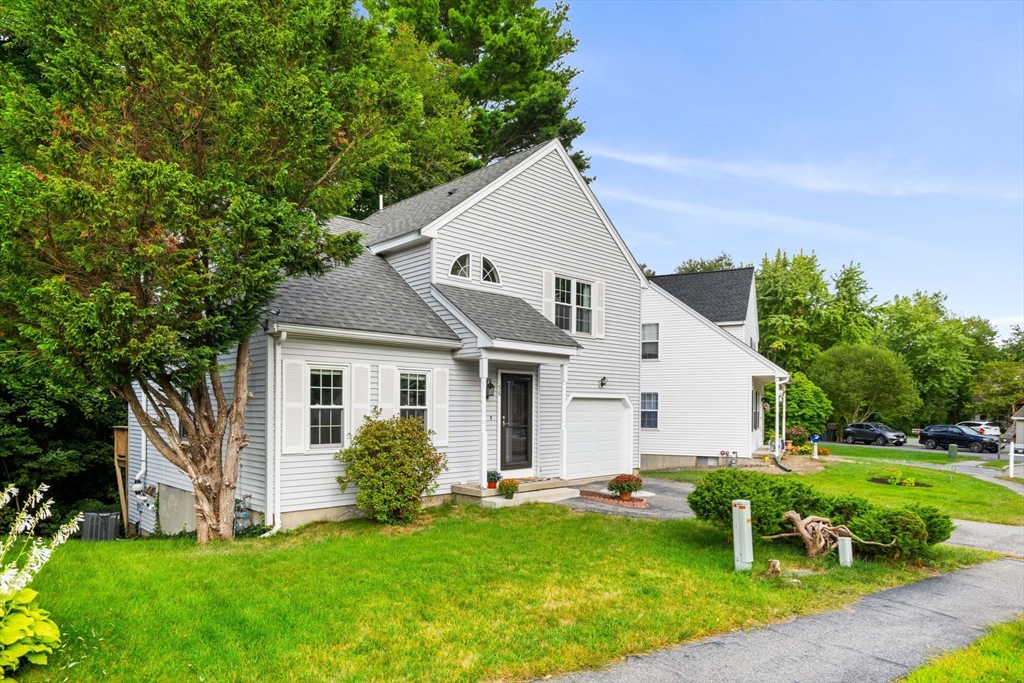58 Meadowood Road North Andover, MA 01845 - Photo 31 of 31 a view of a house with a yard and sitting area