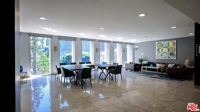 a view of a dining room with furniture window and outside view