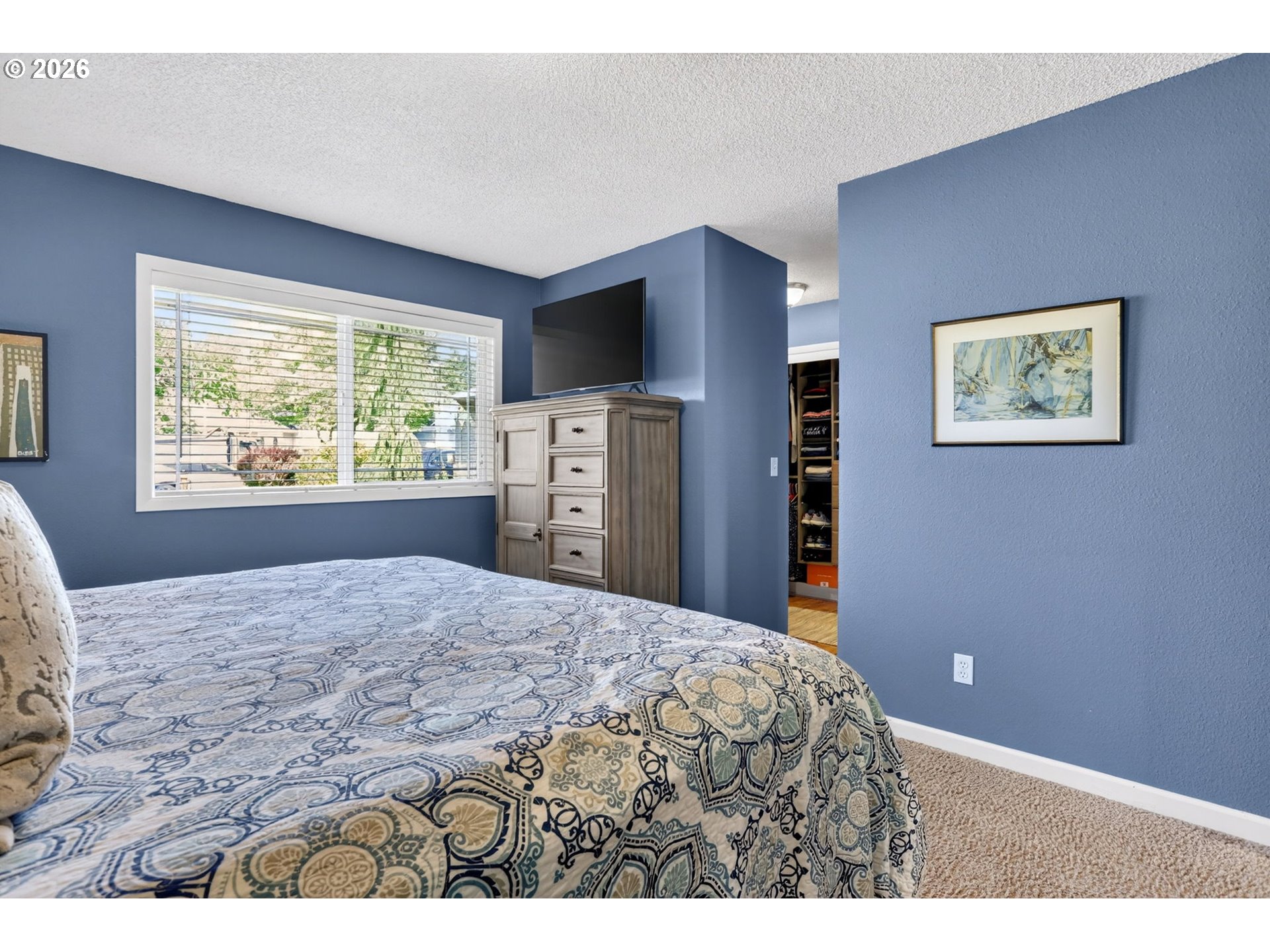 1776 Southeast 114th Place Portland, OR 97216 - Photo 30 of 47 a bedroom with a bed and a window