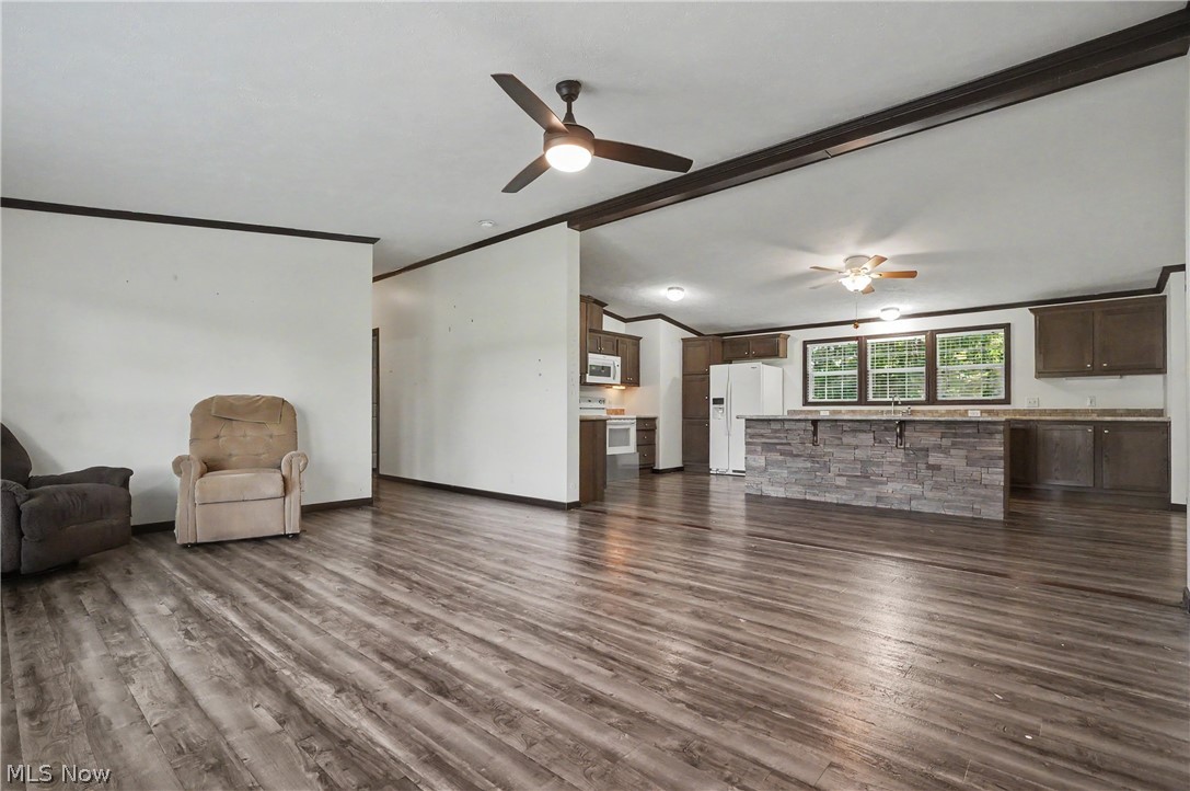 3424 Painesville Warren State Road Southington, OH 44470 - Photo 11 of 50 3424 Painesville Warren Rd, Southington, OH 44470 – Enjoy comfortable one-floor living in this well-maintained home built in 2018. Featuring 3 bedrooms, 2 full bathrooms, and an open-concept layout, this home offers both functionality and convenience. The spacious kitchen, dining, and living areas provide plenty of room for everyday living and entertaining. A large garage offers ample space for vehicles, storage, hobbies, or workshop needs. Situated on a generous lot with a welcoming front porch, this property combines modern living with a peaceful country setting. Move-in ready and waiting for its next owner!