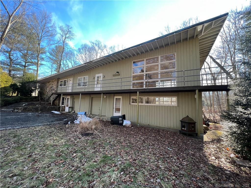 98 Old Long Ridge Road Stamford, CT 06903 - Photo 1 of 1 a front view of a house with garden