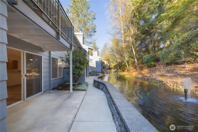 a view of balcony with two chairs and a table
