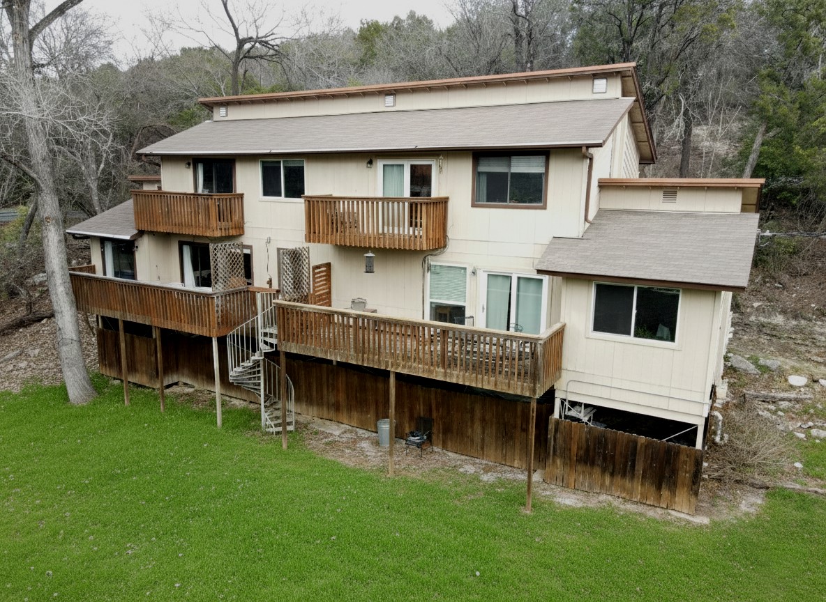 a view of a house with a roof deck