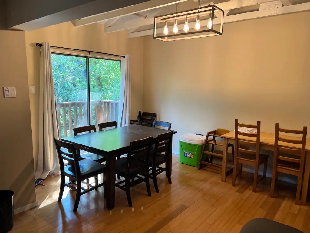 903 The High Road Austin, TX 78746 - Photo 29 of 39 a view of a dining room with furniture and a window