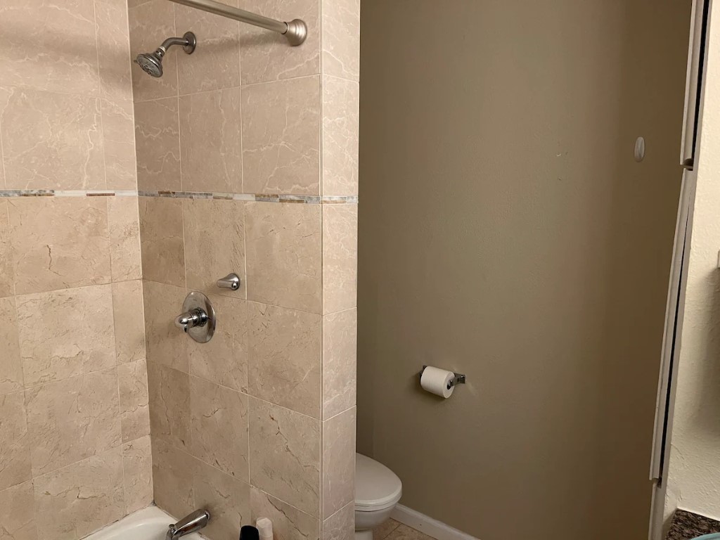 903 The High Road Austin, TX 78746 - Photo 30 of 39 a bathroom with a shower