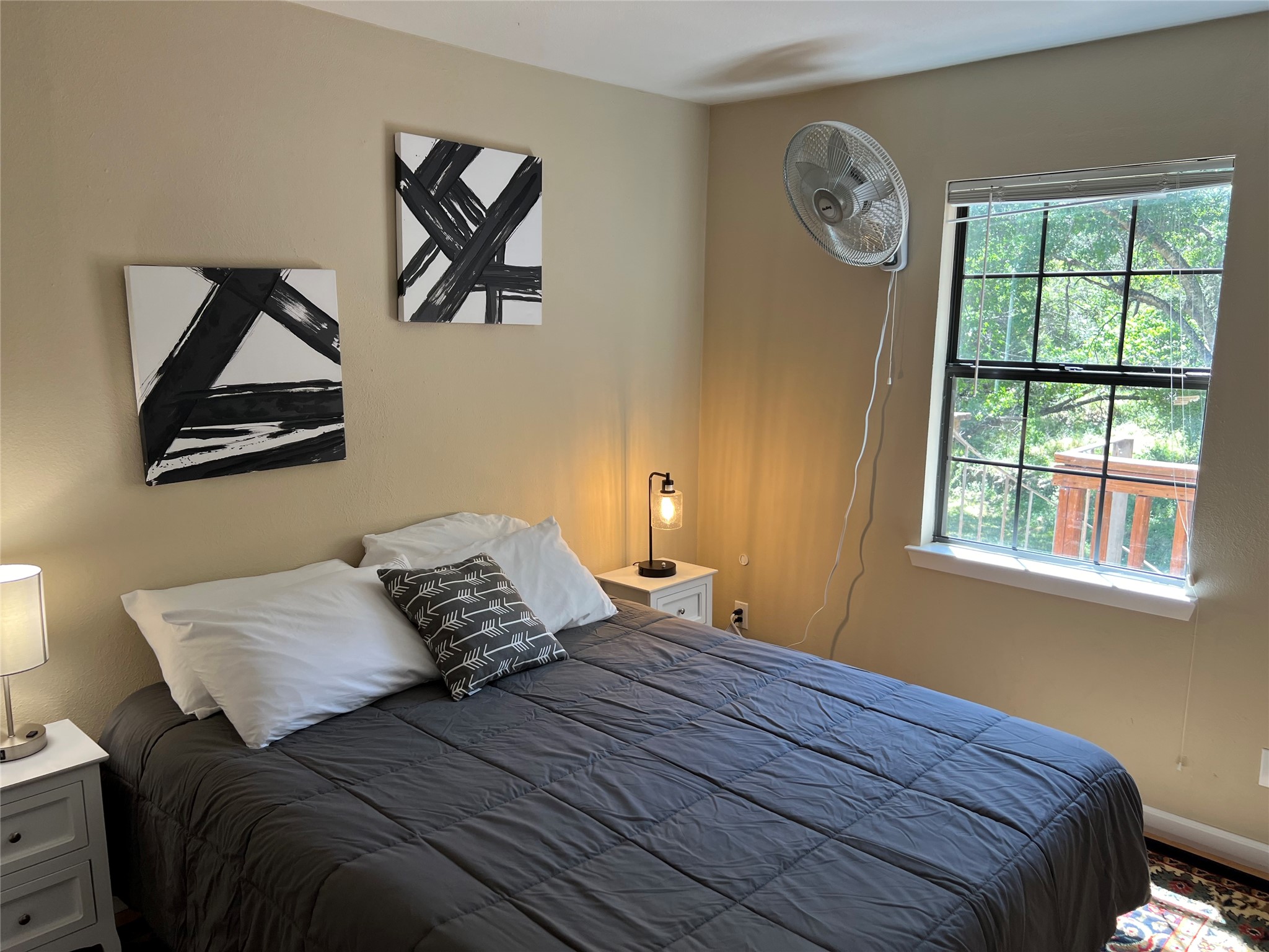 903 The High Road Austin, TX 78746 - Photo 34 of 37 a bedroom with a bed and a window