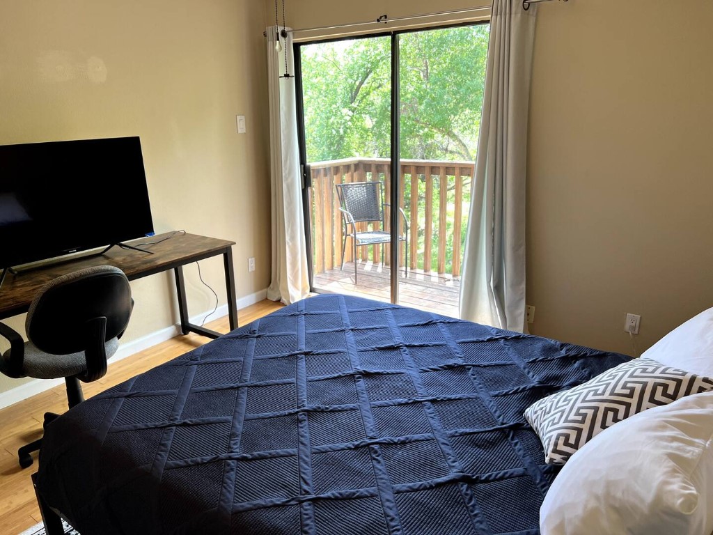 903 The High Road Austin, TX 78746 - Photo 37 of 39 a view of balcony with wooden floor