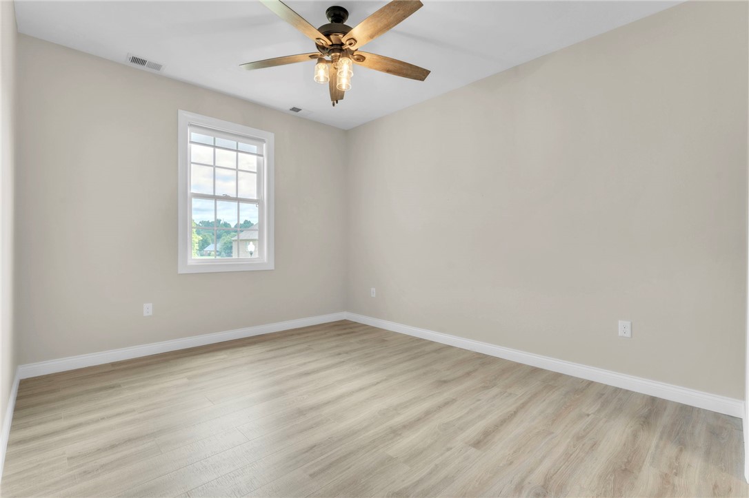 1015 Winmar Drive Anderson, SC 29621 - Photo 33 of 49 This spacious room features ample natural light and durable flooring, perfect for versatile living.