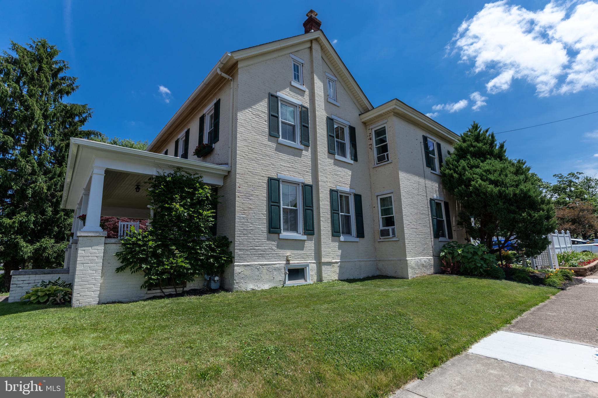 Side view of this beautiful brick colonial