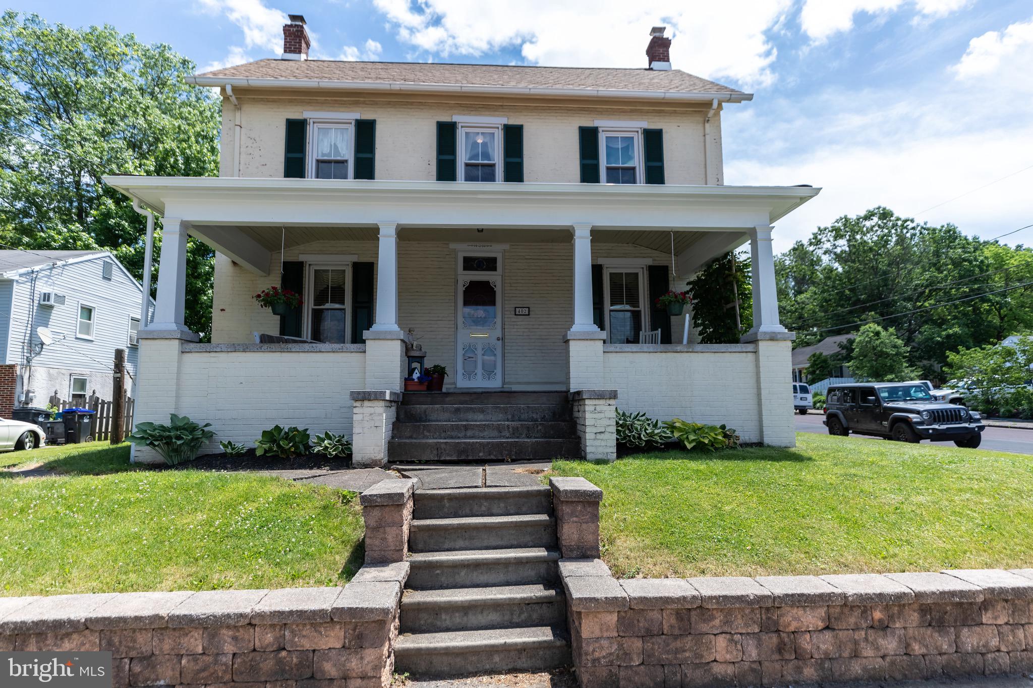 Front view of the steps and gorgeous front porch