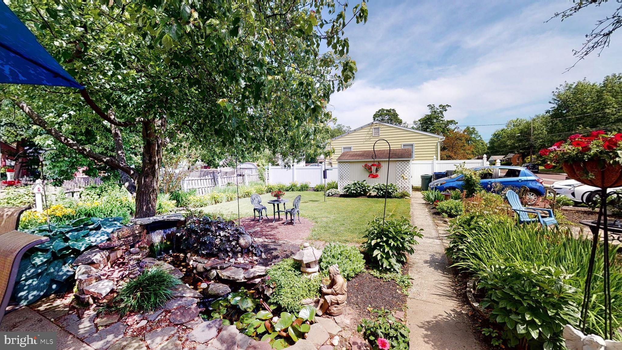 402 East Reliance Road Souderton, PA 18964 - Photo 43 of 77 A view from the patio out back to the shed