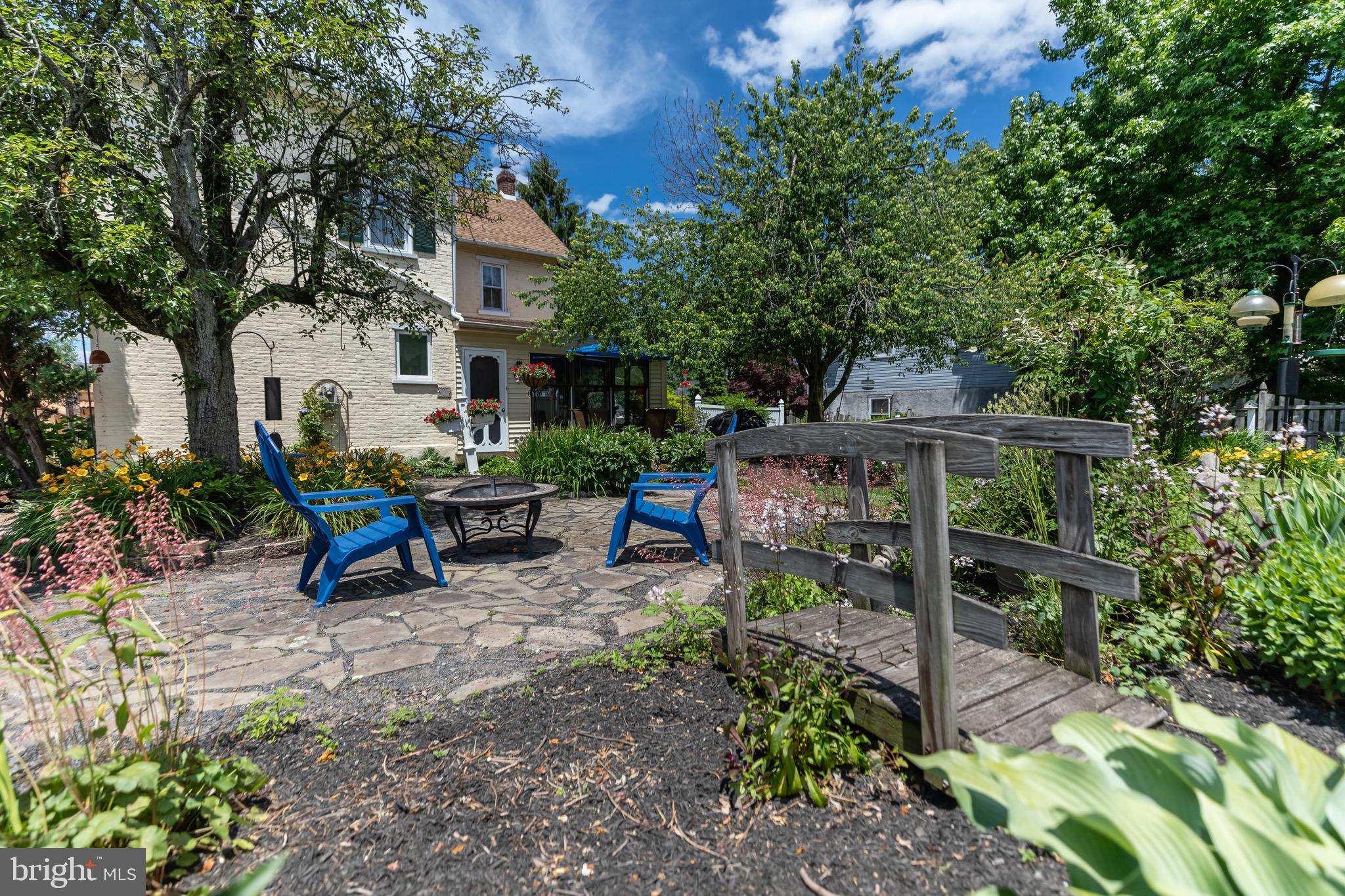 You'll love  the amazing yard and gardens