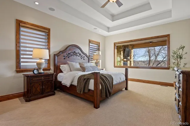 a spacious bathroom with a double vanity sink a mirror and a shower