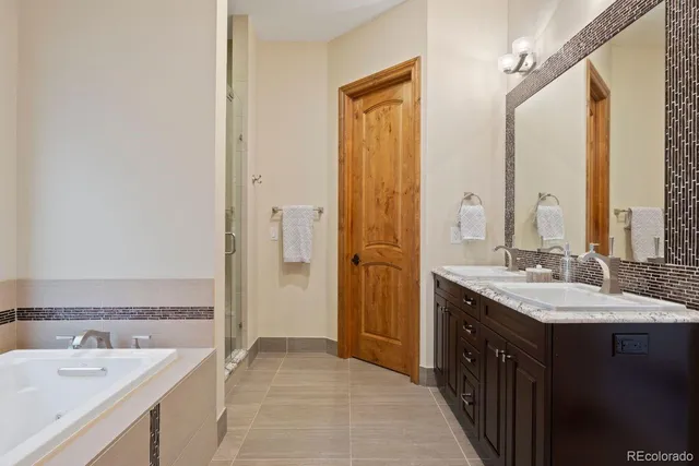 a kitchen with stainless steel appliances granite countertop a stove and a microwave