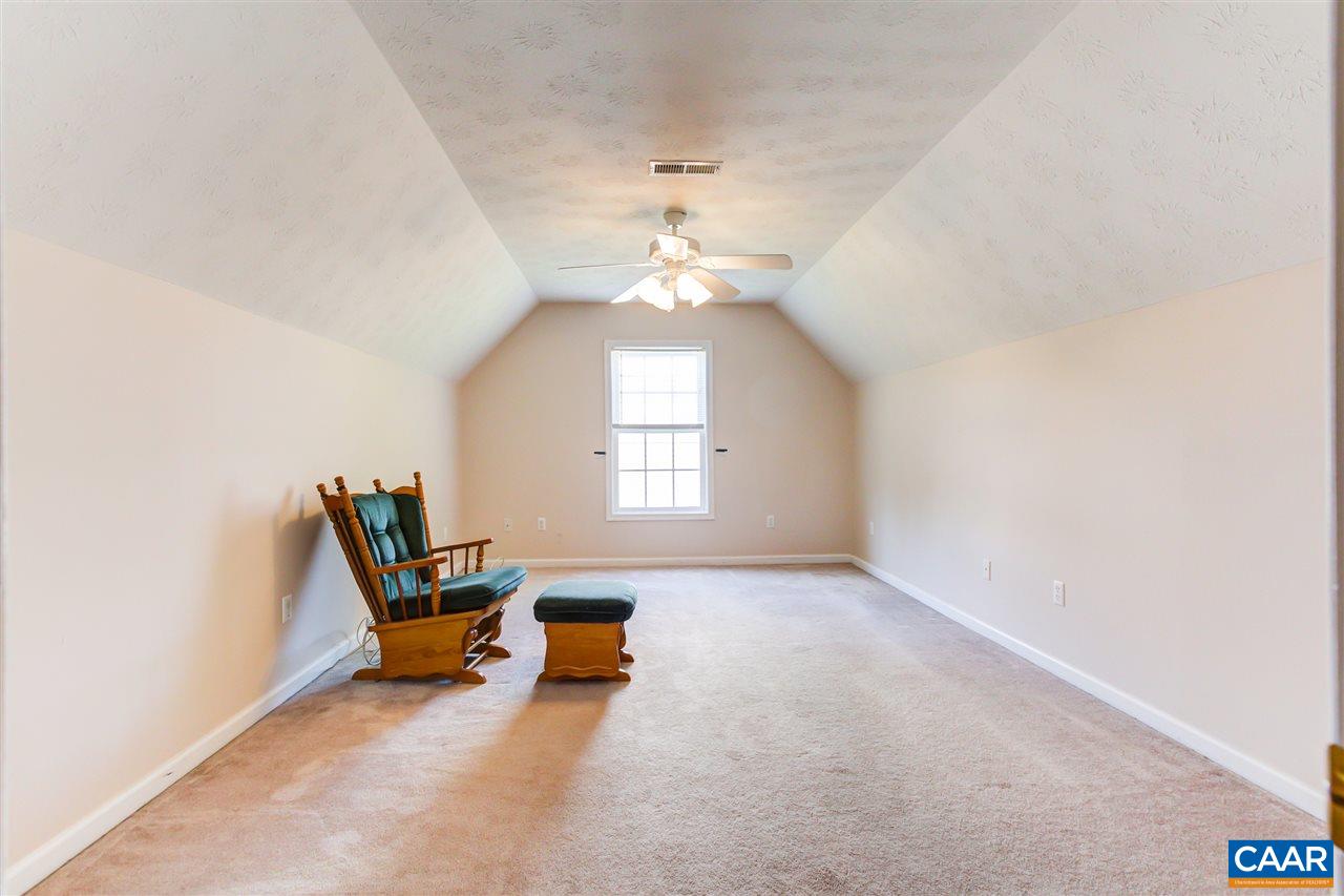 24 Sir Robin Road Waynesboro, VA 22980 - Photo 14 of 17 an empty room with windows and ceiling fan