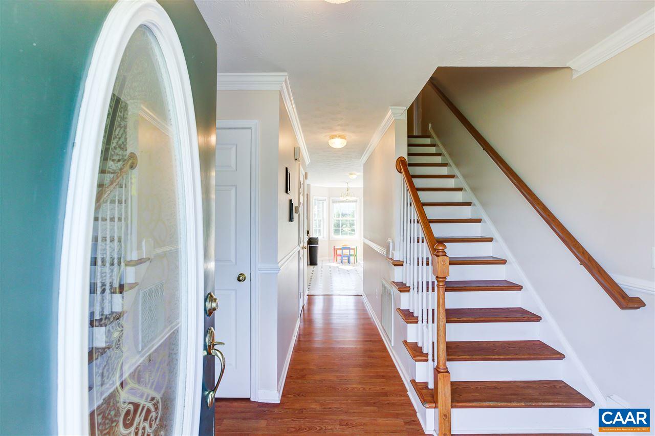 24 Sir Robin Road Waynesboro, VA 22980 - Photo 3 of 17 a view of a hallway with wooden floor and entryway