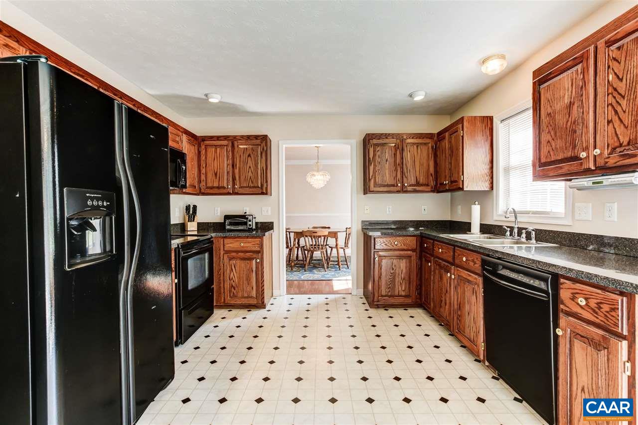 24 Sir Robin Road Waynesboro, VA 22980 - Photo 6 of 17 a kitchen with stainless steel appliances granite countertop a refrigerator stove top oven a sink and dishwasher