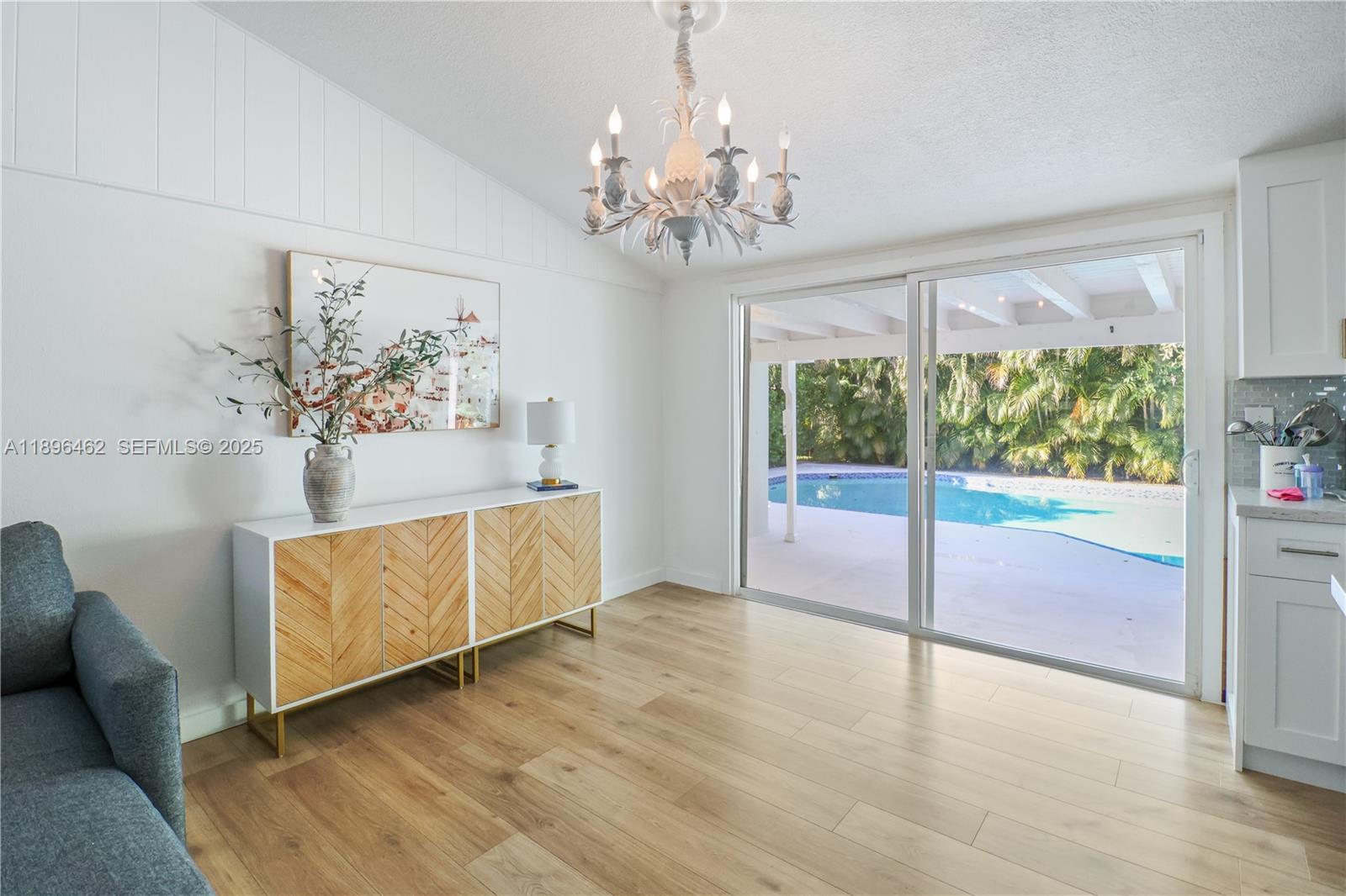 5055 Garfield Road Delray Beach, FL 33484 - Photo 4 of 29 a view of an empty room with a window