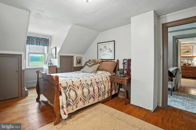 a patio with yard glass top table and chairs
