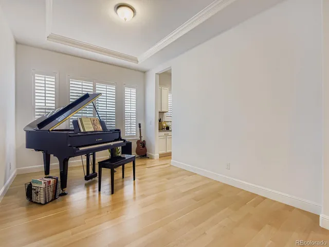a room with furniture and wooden floor