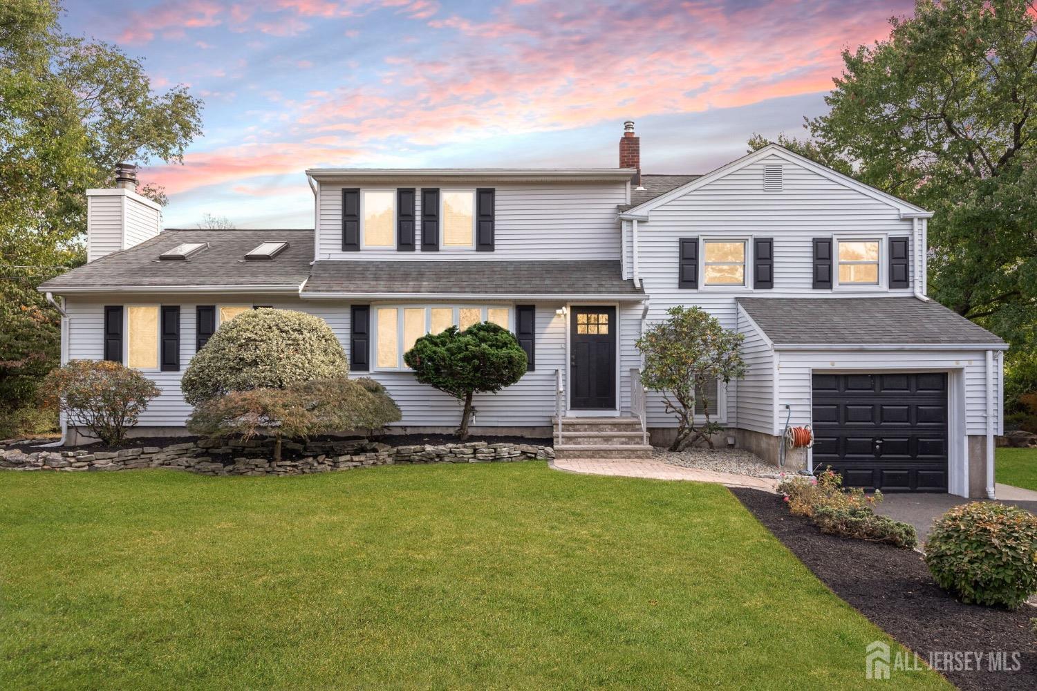 321 Overbrook Road Piscataway, NJ 08854 - Photo 1 of 46 a front view of a house with a yard
