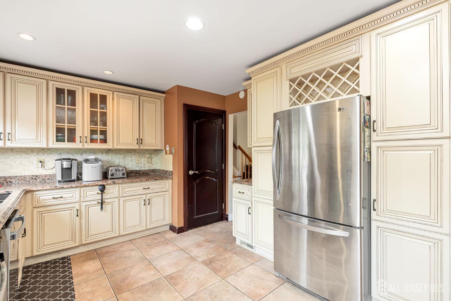 321 Overbrook Road Piscataway, NJ 08854 - Photo 14 of 46 a kitchen with stainless steel appliances granite countertop a refrigerator and a sink