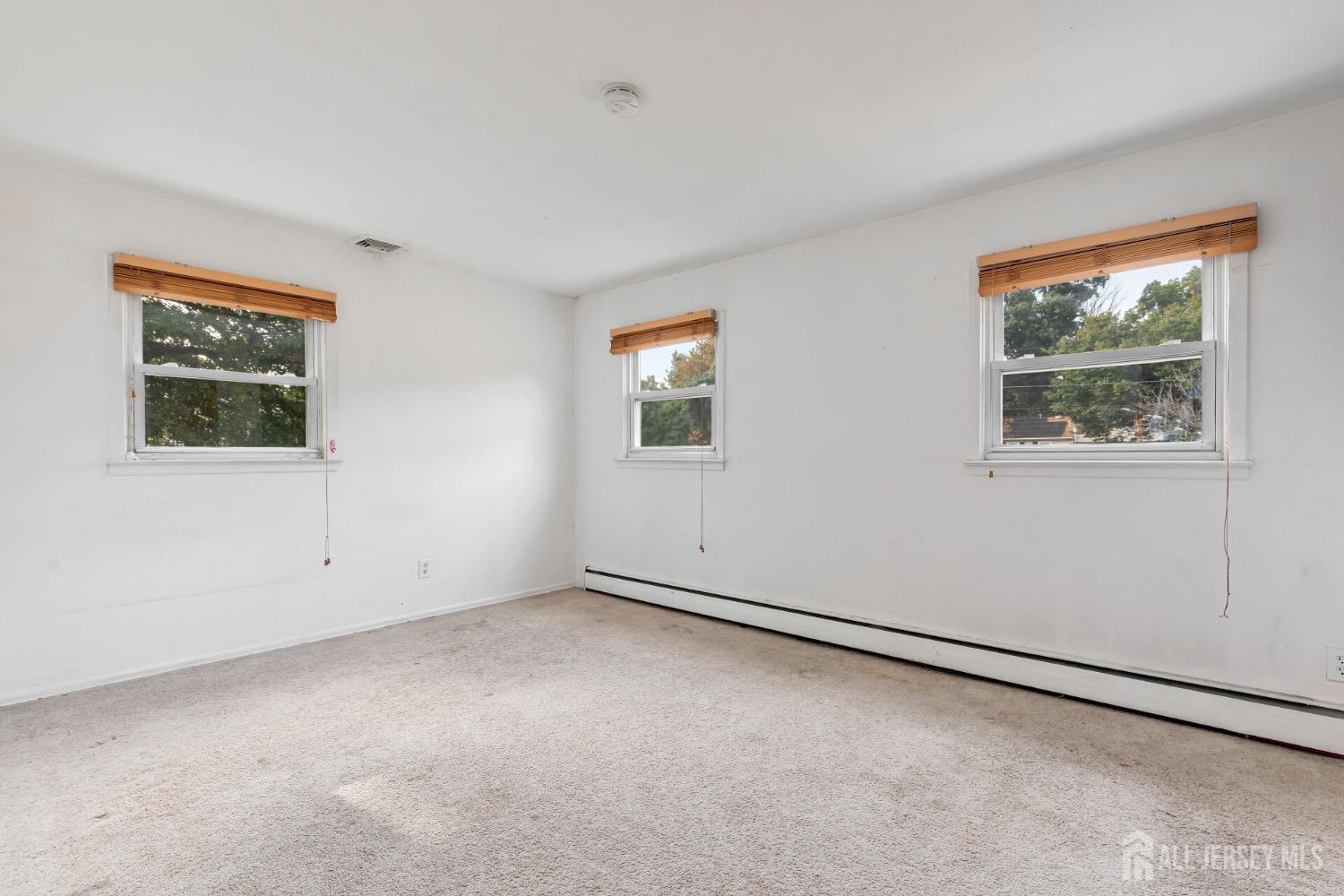 321 Overbrook Road Piscataway, NJ 08854 - Photo 15 of 46 a view of an empty room with a window