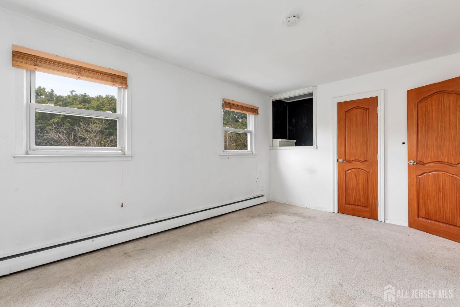 321 Overbrook Road Piscataway, NJ 08854 - Photo 16 of 46 a view of an empty room with a window