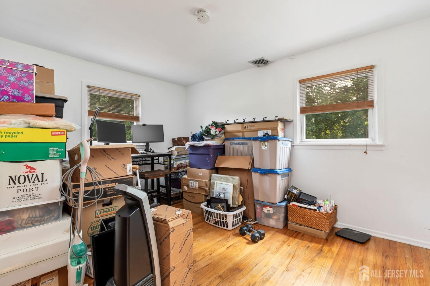 321 Overbrook Road Piscataway, NJ 08854 - Photo 17 of 46 a room with gym equipment and windows