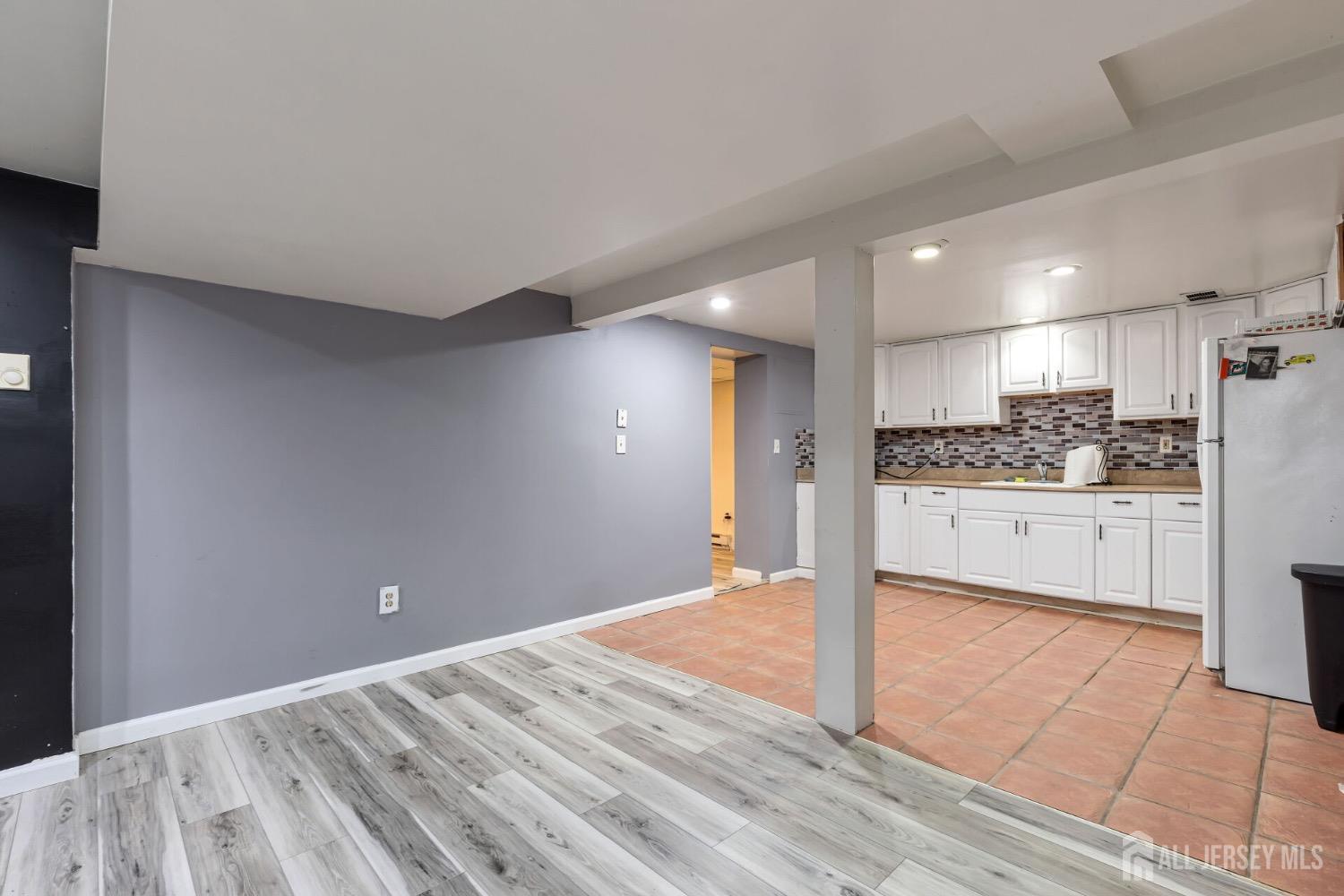 321 Overbrook Road Piscataway, NJ 08854 - Photo 25 of 46 a view of a kitchen with a sink and cabinets