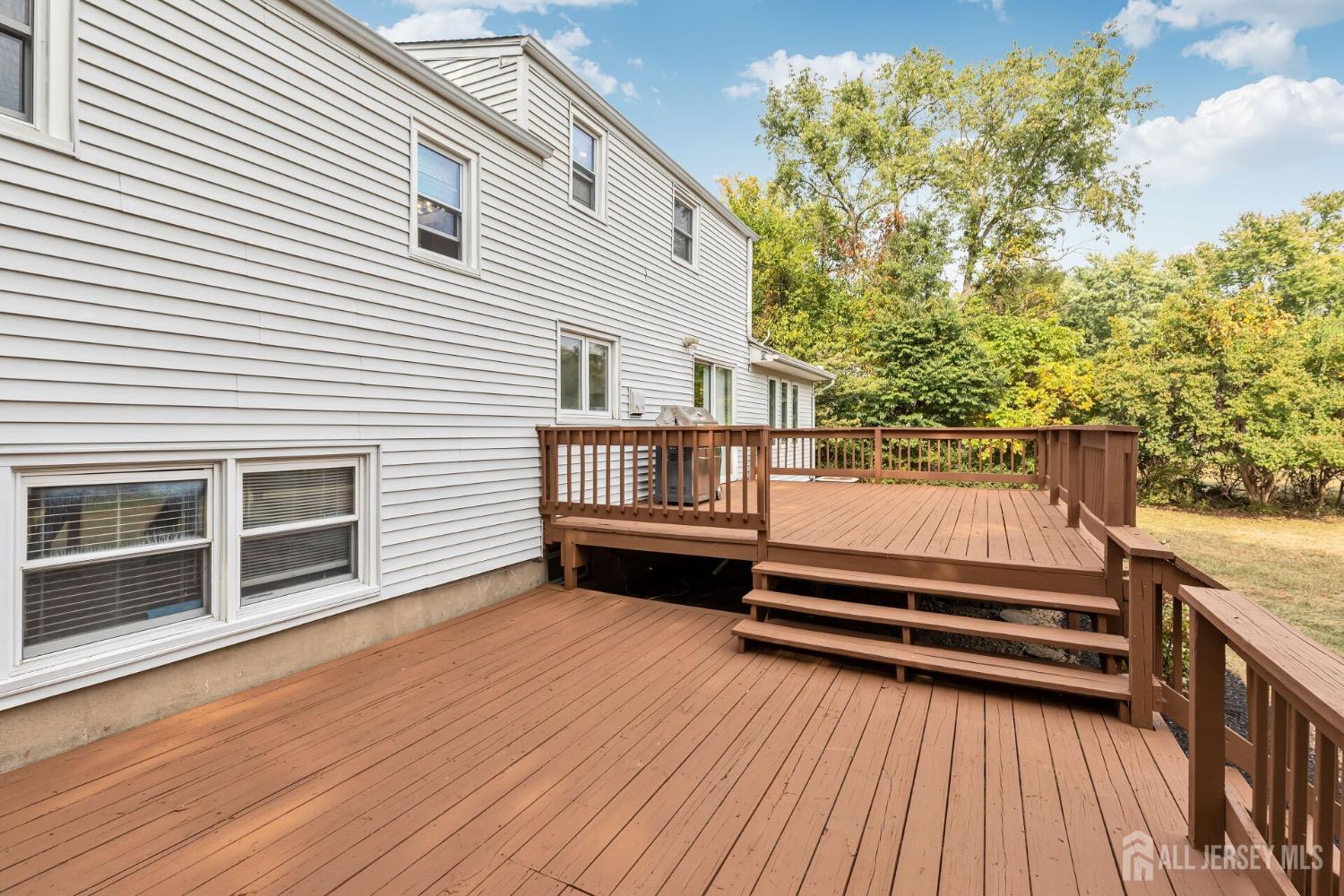 321 Overbrook Road Piscataway, NJ 08854 - Photo 31 of 46 a backyard of a house with wooden floor and fence