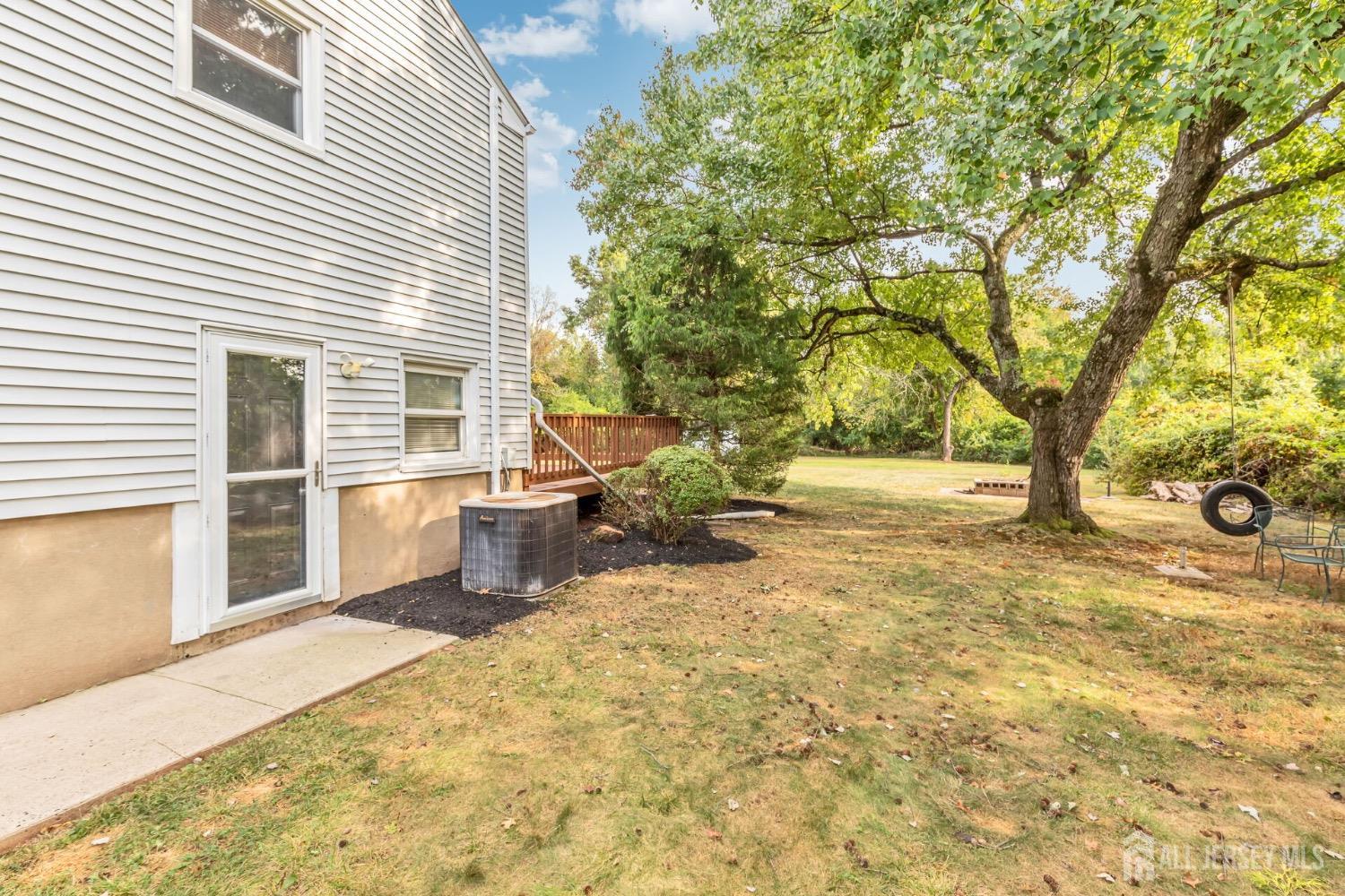 321 Overbrook Road Piscataway, NJ 08854 - Photo 33 of 46 a backyard of a house with table and chairs