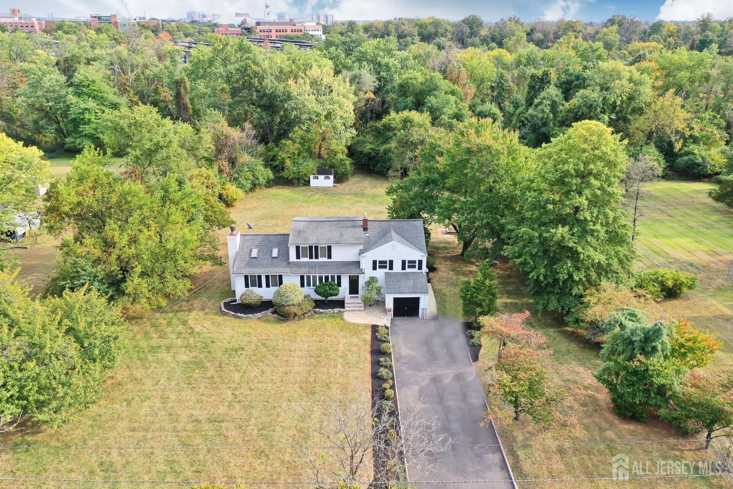 321 Overbrook Road Piscataway, NJ 08854 - Photo 36 of 46 an aerial view of a house with a yard basket ball court and outdoor seating