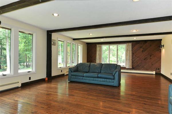 453 Harvard Road Bolton, MA 01740 - Photo 6 of 20 a living room with furniture and a large window
