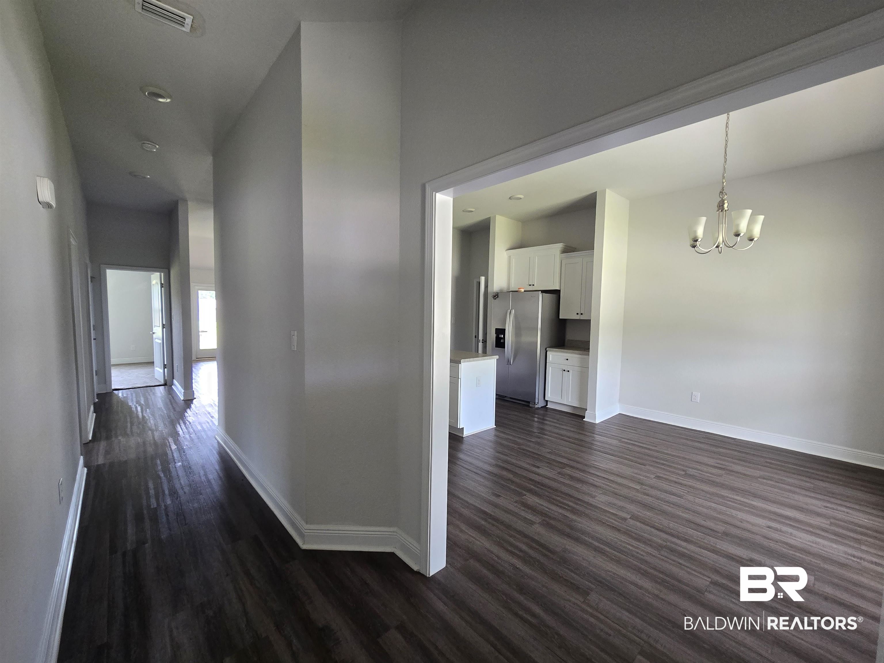 23035 Ridgewood Drive Robertsdale, AL 36567 - Photo 2 of 17 Entry/Dining/Kitchen