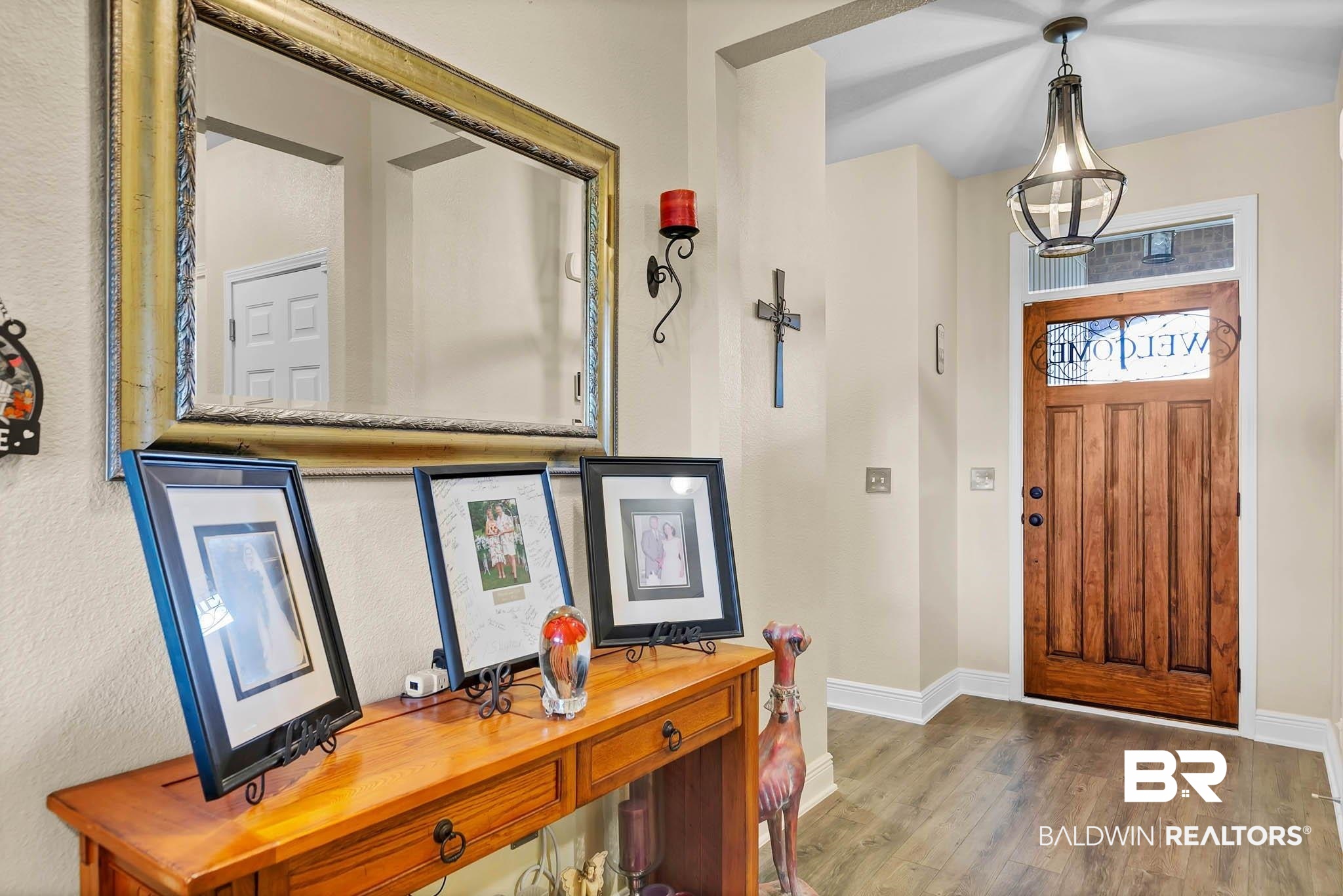 2049 Bourbon Street Foley, AL 36535 - Photo 8 of 56 Entrance foyer featuring wood finished floors and baseboards