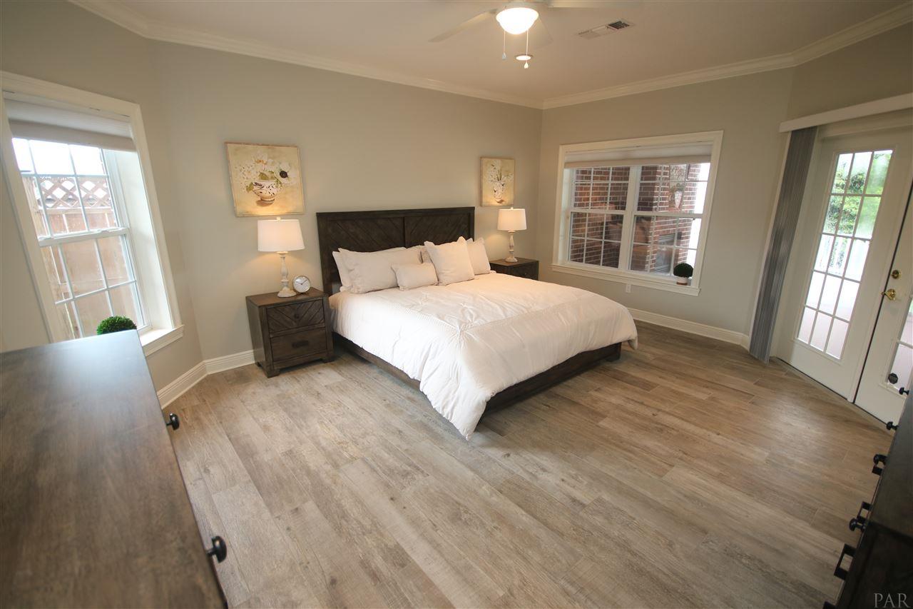 6021 Otter Point Road Pensacola, FL 32504 - Photo 29 of 50 tile flooring, crown molding & recessed lights!