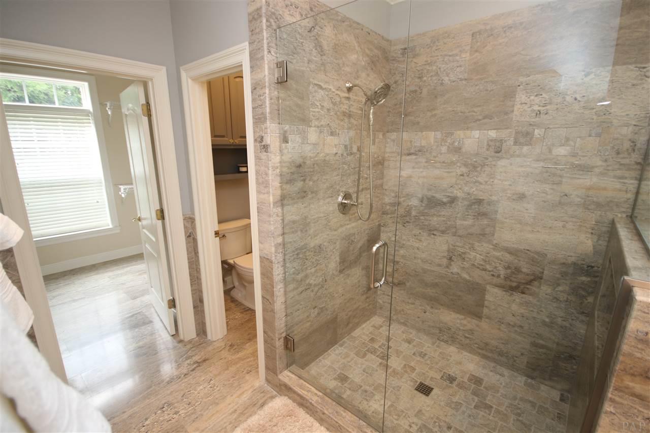 6021 Otter Point Road Pensacola, FL 32504 - Photo 35 of 50 fixtures. 10.6 x 8.6 walk-in closet with a window.