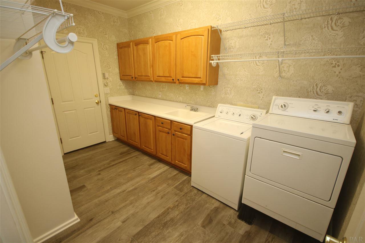 6021 Otter Point Road Pensacola, FL 32504 - Photo 39 of 50 sink & easy glide rack system.